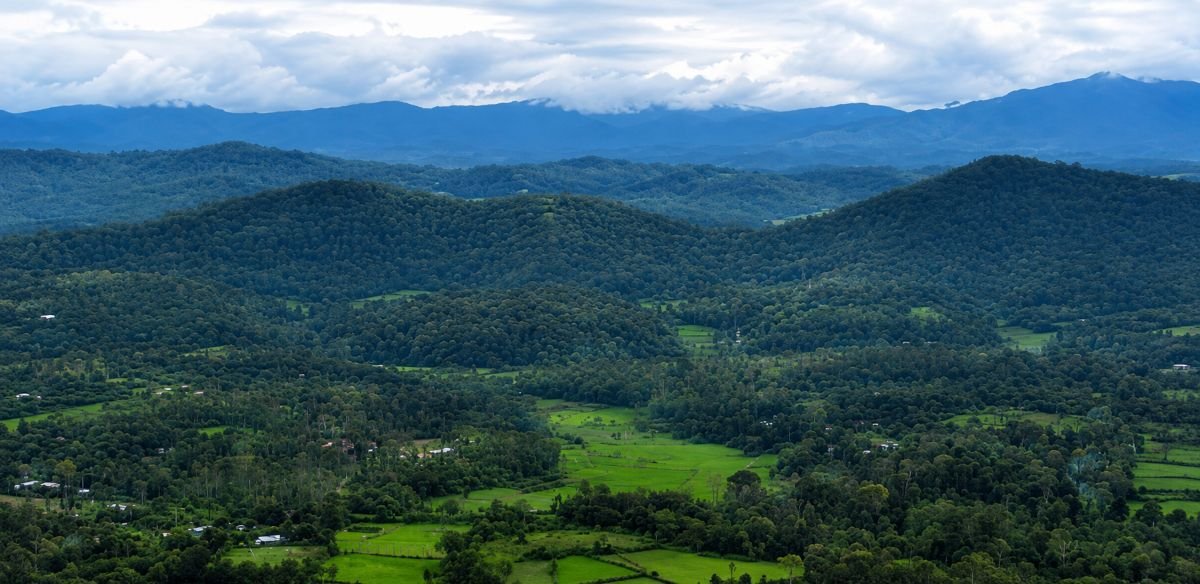 Serene valley with distant mountains